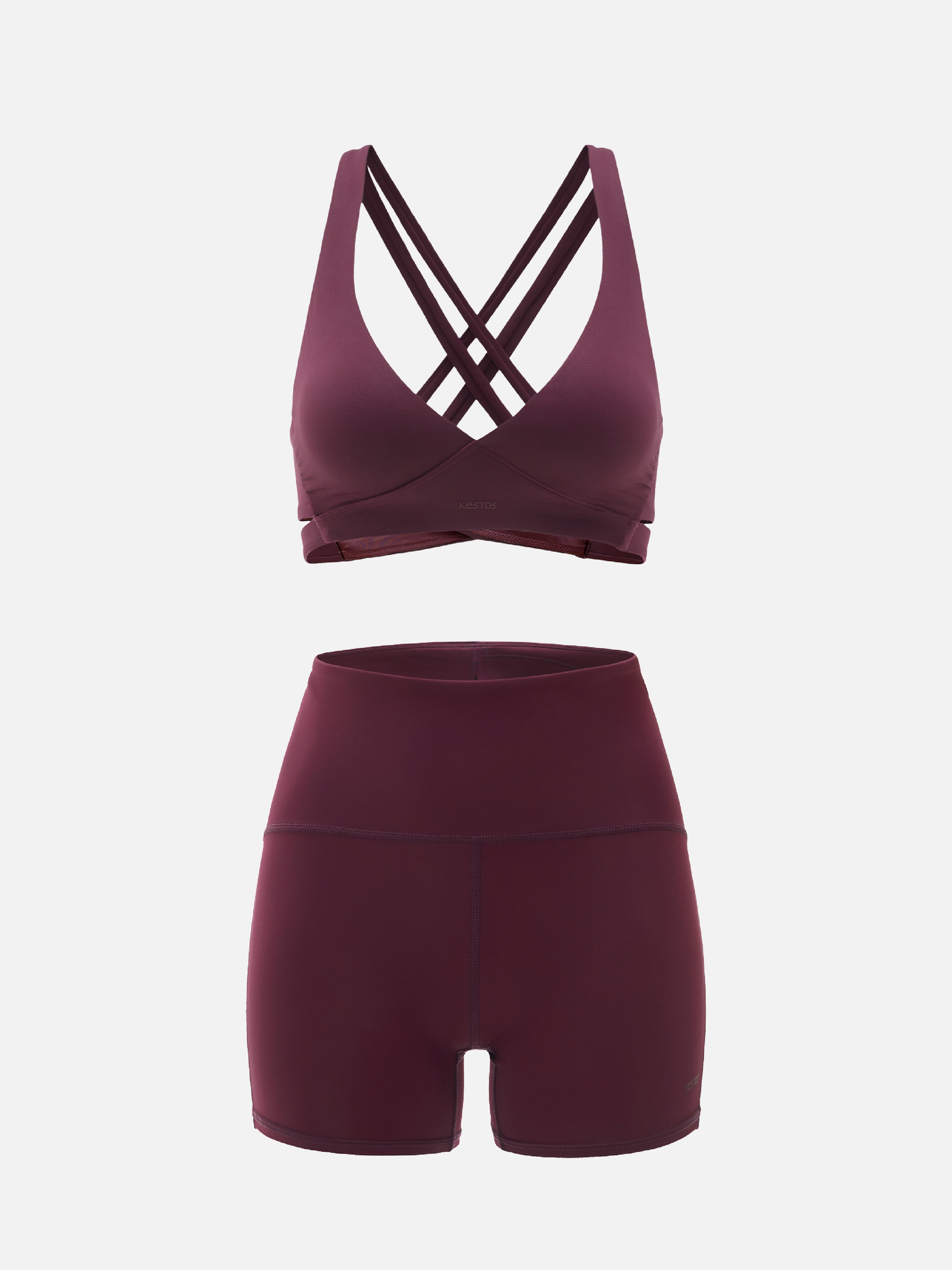 Maroon sports bra and shorts set on a light gray background
